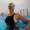Kneeskin MF-X negro aprobado por la FINA, llevado por un nadador con gorro blanco y gafas espejadas en la piscina