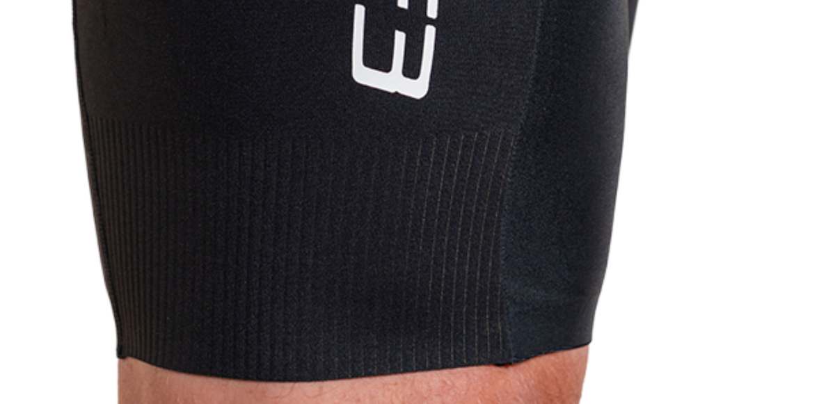 Close up of Lava Long Distance Full Zip Short Sleeve Trisuit on a white background